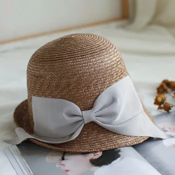 Női nyári kalapok Retro Upturn Brim Nap kalap Cloche szalmakalapok Bow vödör Napsapkák Esküvői parti Egyházi derby Kültéri utazási kalapok
